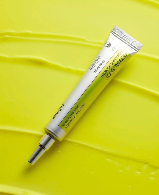 Retinal Shot Celimax — tubo sobre fondo amarillo